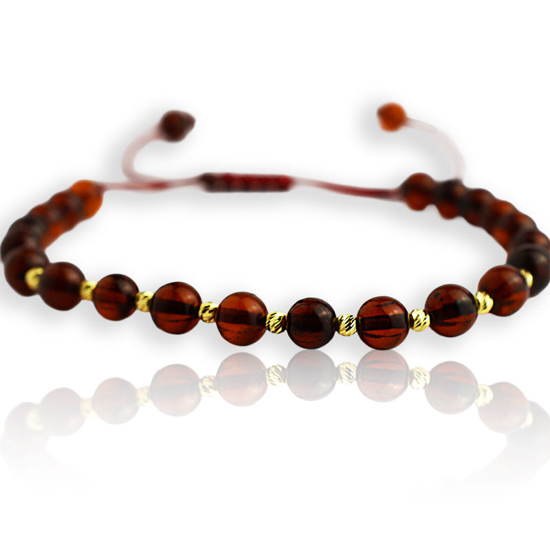 Златна гривна на конец с кехлибар